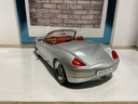 1:18 MAISTO PORSHE BOXSTER SILVER ON RED image