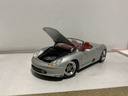 1:18 MAISTO PORSHE BOXSTER SILVER ON RED image