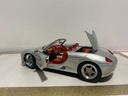 1:18 MAISTO PORSCHE BOXSTER SILVER ON RED image