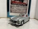 1:18 BURAGO  ITALY 1954 MERCEDES 300 SL GULLWING SILVER ON RED image