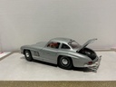 1:18 BURAGO  ITALY 1954 MERCEDES 300 SL GULLWING SILVER ON RED image