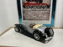 1:18 BURAGO ITALY 1936 MERCEDES  500K BLACK/SILVER ON TAN image