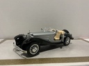 1:18 BURAGO ITALY 1936 MERCEDES  500K BLACK/SILVER ON TAN image
