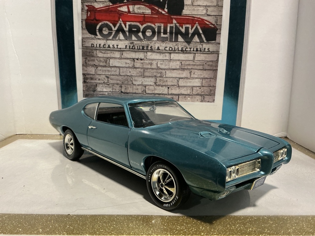 1:18 ERTZ 1969 PONTIAC GTO BLUE ON BLACK (NO MIRROR/WINDSHEILD) image