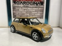 1:18 MAISTO MINI COOPER GOLD ON BLACK image