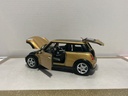 1:18 MAISTO MINI COOPER GOLD ON BLACK image