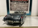 1:18 ROAD TOUGH 1957 CORVETTE SILVER ON CREAM image