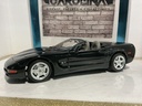 1:18 BURAGO 1997 CORVETTE BLACK ON GRAY image