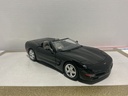 1:18 BURAGO 1997 CORVETTE BLACK ON GRAY image