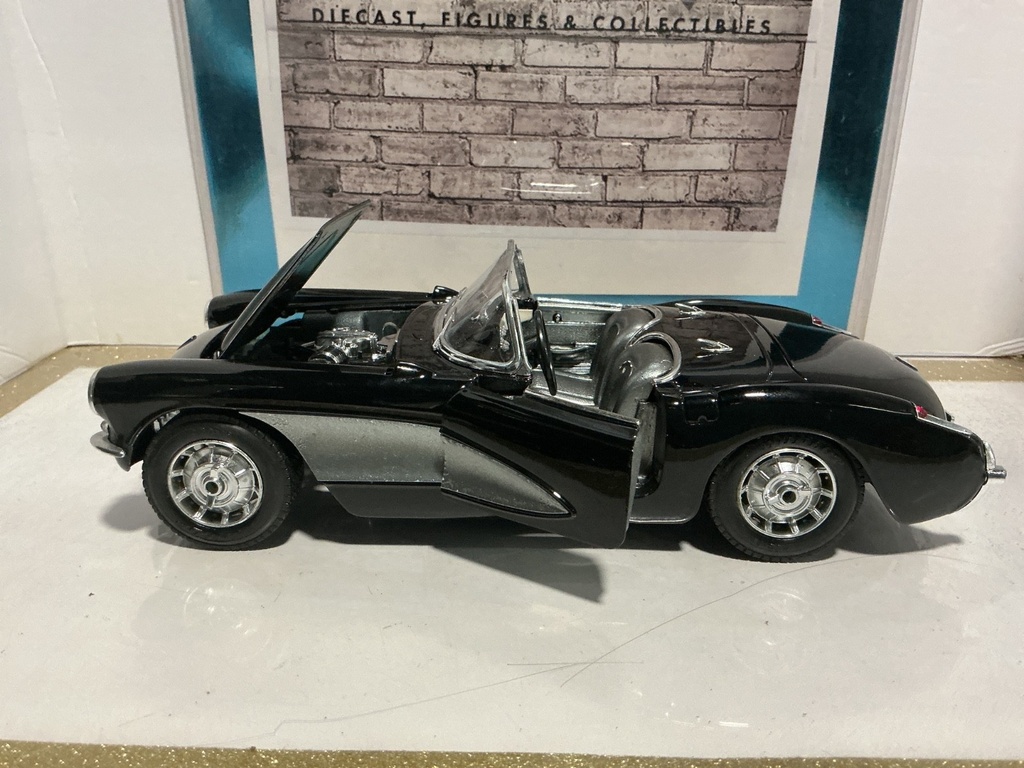1:18 BURAGO 1957 BLACK ON SILVER [PAINT RASHING] image