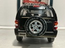 1:18 MATCHBOX JEEP LIBERTY BLACK ON TAN [NO BOX] image