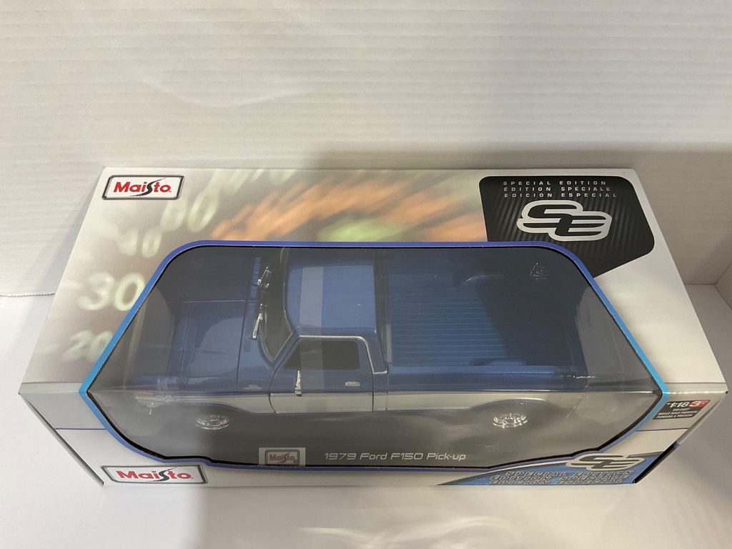 1:18 MAISTO 1979 FORD F150 PICK-UP BLUE WITH WHITE STRIPES image
