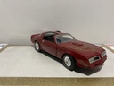1:18 ERTL 1977 FIREBIRD BURGUNDY ON BLACK [PAINT BUBBLES] [NO BOX] (HOOD BROKEN) image