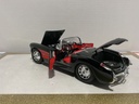 1:18 BBURAGO 1957 CORVETTE BLACK ON RED [NO BOX] image