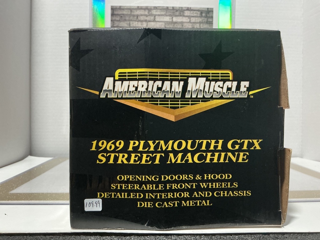 1:18 AMERICAN MUSCLE 1969 PLYMOUTH STREET MACHINE BRONZE OVER BLACK image