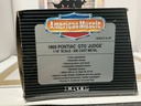 1:18 ERTL 1969 PONTIAC GTO JUDGE ORANGE ON BLACK image