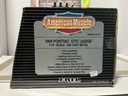 1:18 ERTL 1969 PONTIAC GTO JUDGE ORANGE ON BLACK image