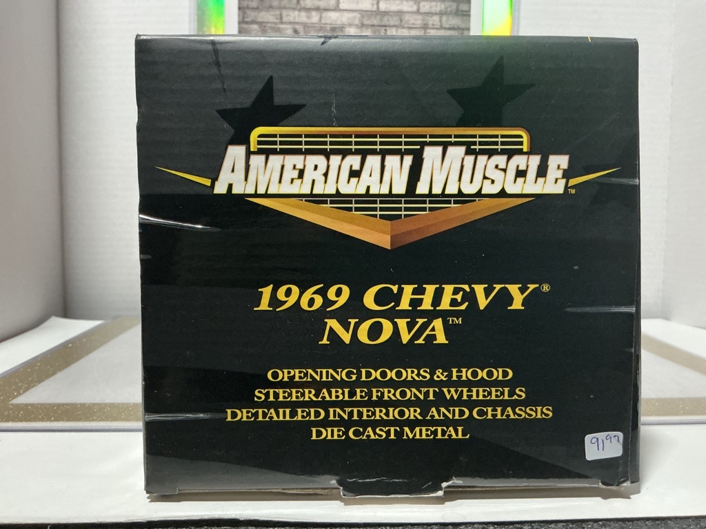 1:18 ERTL / AMERICAN MUSCLE 1969 CHEVY NOVA ORANGE RED ON BLACK image