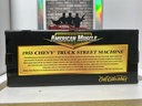 1:18 ERTL 1955 CHEVY TRUCK STREET MACHINE RED ON GREY image