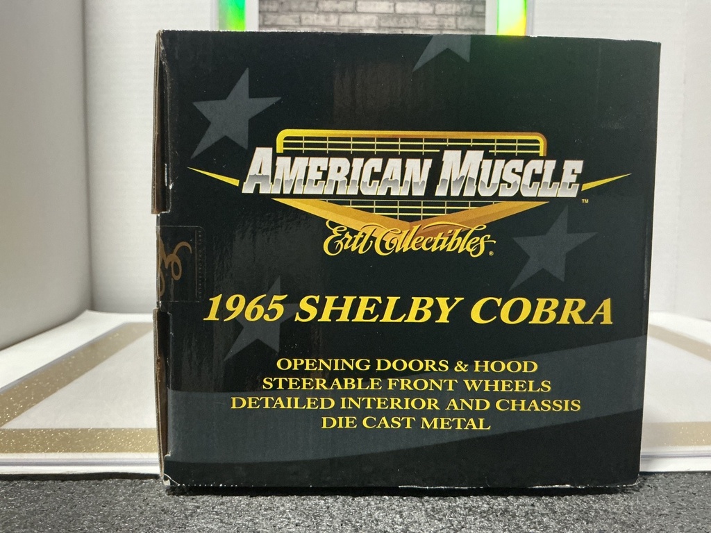 1:18 ERTL 10TH ANNIVERSARY 1965 SHELBY COBRA RED ON BLACK image