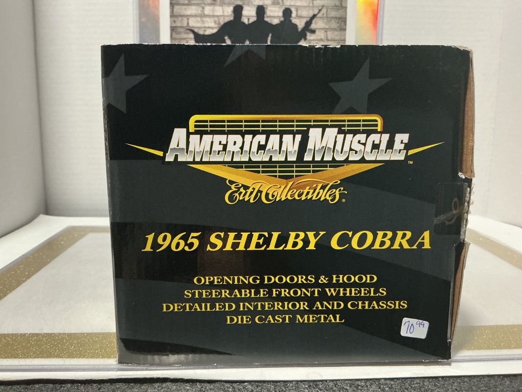 1:18 ERTL 10TH ANNIVERSARY 1965 SHELBY COBRA RED ON BLACK image