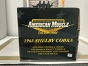 1:18 ERTL 10TH ANNIVERSARY 1965 SHELBY COBRA RED ON BLACK image
