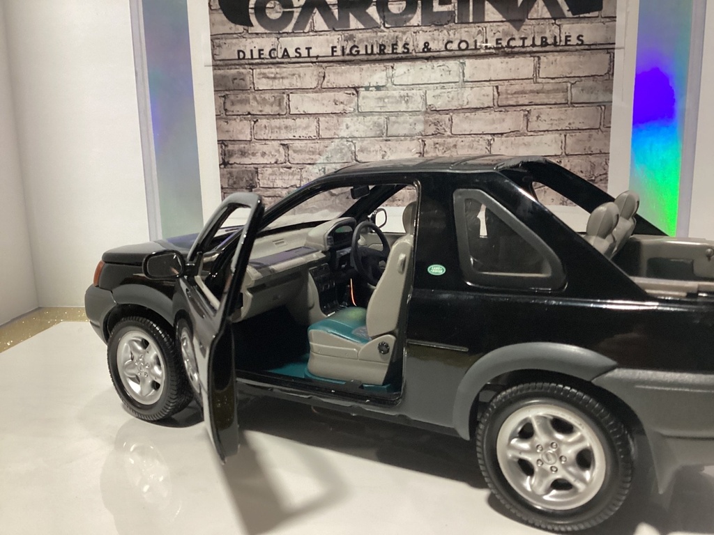 1:18 ERTL 1996 Range Rover Freelander Black on Grey + Blue (no wiper) image