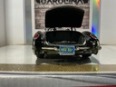1:18 BURAGO 1957 CHEVROLET CORVETTE BLACK ON RED CONVERTIBLE image
