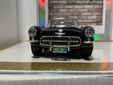 1:18 BURAGO 1957 CHEVROLET CORVETTE BLACK ON RED CONVERTIBLE image