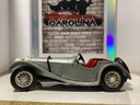1:18 Burago 1937 Jaguar SS 100 Grey on Red (no windshield) image