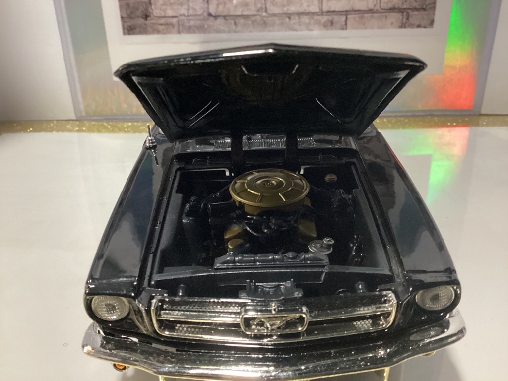 1:18 Motor Max 1964 1/2 Ford Mustang Black on White (molding broken) image