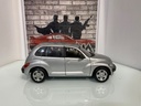 1:18 MAISTO PT CRUISER SILVER ON GREY image