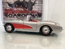 1:18 BURAGO 1957 CHEVROLET CORVETTE SILVER ON RED CONVERTIBLE image