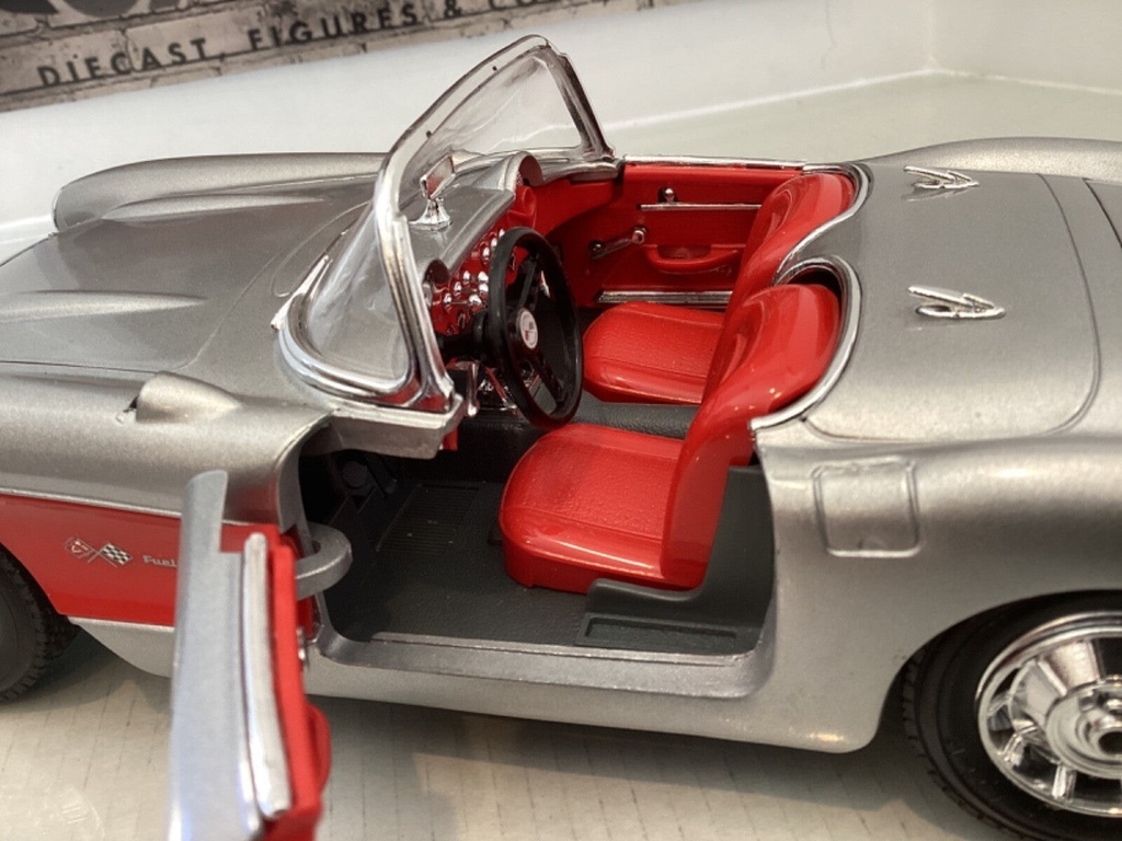1:18 BURAGO 1957 CHEVROLET CORVETTE SILVER ON RED CONVERTIBLE image