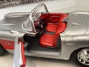 1:18 BURAGO 1957 CHEVROLET CORVETTE SILVER ON RED CONVERTIBLE image