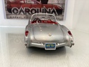 1:18 BURAGO 1957 CHEVROLET CORVETTE SILVER ON RED CONVERTIBLE image