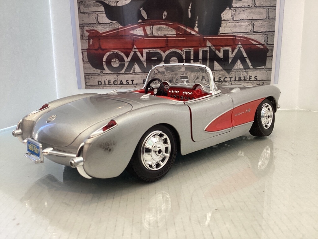 1:18 BURAGO 1957 CHEVROLET CORVETTE SILVER ON RED CONVERTIBLE image