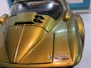 1:18 EXOTO SUZUKA SUN CORVETTE [GOLD/BLACK] [RASHING] [BOX & WIPERS DAMAGED] image
