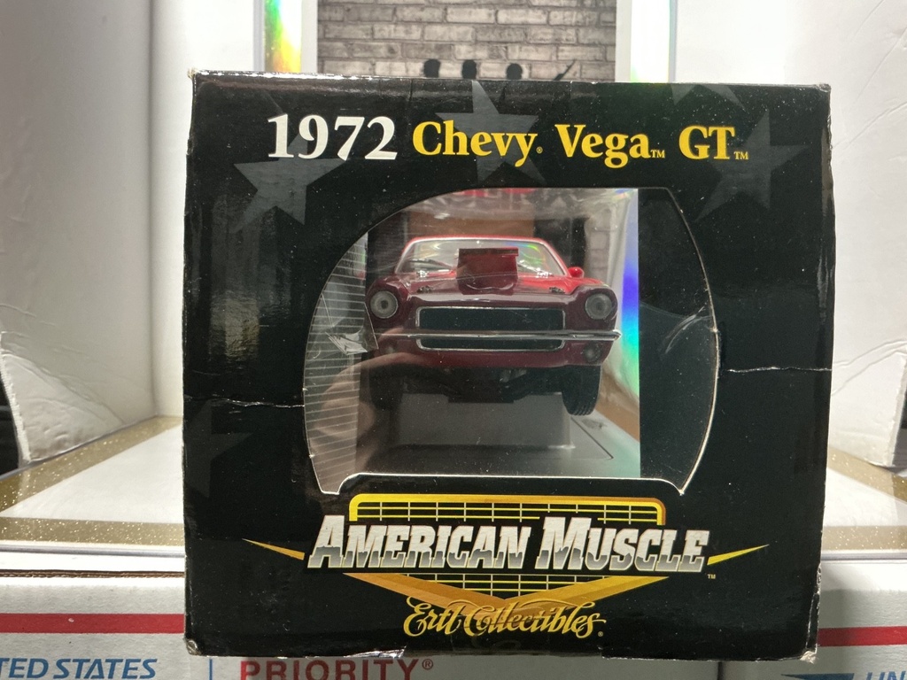 1:18 ERTL AMERICAN MUSCLE - 1972 CHEVY VEGA GT [RED/BLACK] image