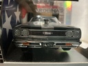 1:18 ERTL  AMERICAN MUSCLE 1969 PLYMOUTH GTX  [CHROME/GOLD ON BLACK] image