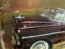 1:18 ERTL  AMERICAN MUSCLE MILLENNIUM - 1955 CHEVROLET [BRONZE CHROME ON WHITE] image