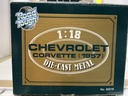 1:18 ROAD TOUGH - 1957 CHEVROLET CORVETTE RED ON WHITE image
