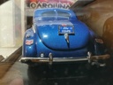 1:18 MOTORMAX TIMELESS CLASSICS - 1940 FORD DELUXE V-8 BLUE ON WHITE image