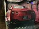 1:18 JADA PINK SLIPS - NISSAN GT-R R35W/LIBERTY WALK BODY KIT 2.0 RED ON BLACK image