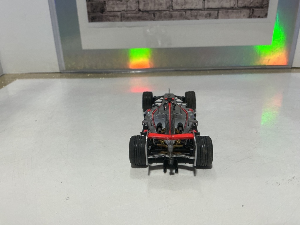 1/43 MINICHAMPS - McLaren Mp4-21 2006 Kimi Raikkonen [NO BOX, NO FRONT BUMPER] image