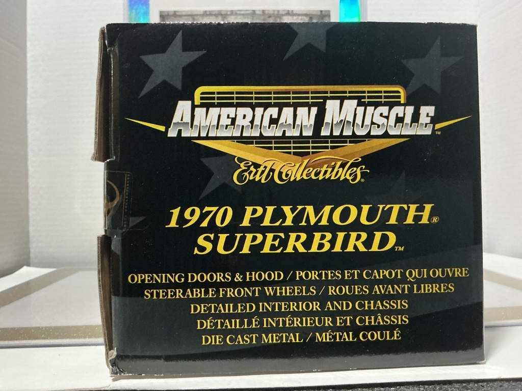1:18 ERTL 1970 PLYMOUTH SUPERBIRD ORANGE ON BLACK [LIGHT RASHING NEAR DOOR] image