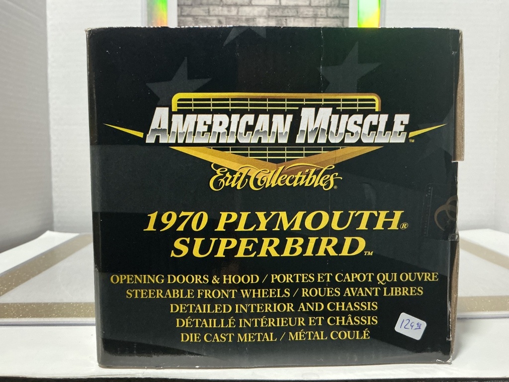 1:18 ERTL 1970 PLYMOUTH SUPERBIRD ORANGE ON BLACK [LIGHT RASHING NEAR DOOR] image