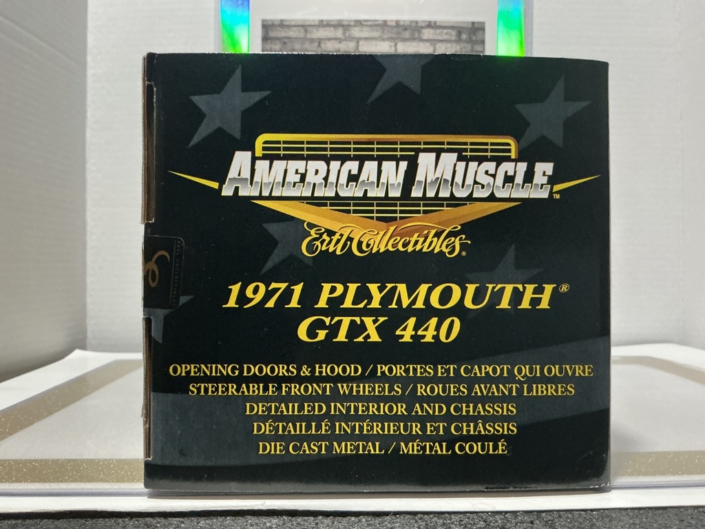 1:18 ERTL 1971 PLYMOUTH GTX 440 YELLOW ON BLACK [DOOR DAMAGED] image