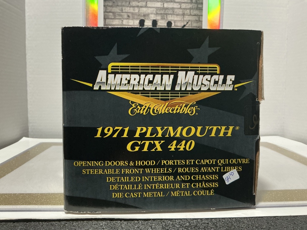 1:18 ERTL 1971 PLYMOUTH GTX 440 YELLOW ON BLACK [DOOR DAMAGED] image