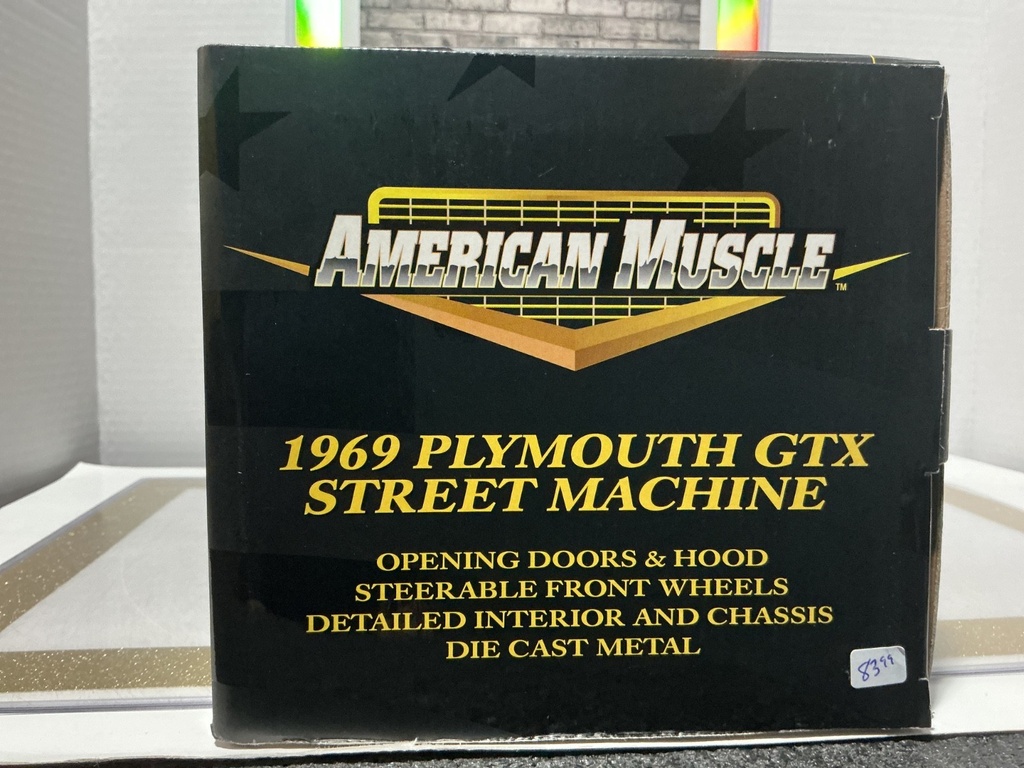 1:18 ERTL 1969 PLYMOUTH GTX STREET MACHINE BRONZE / BLACK image